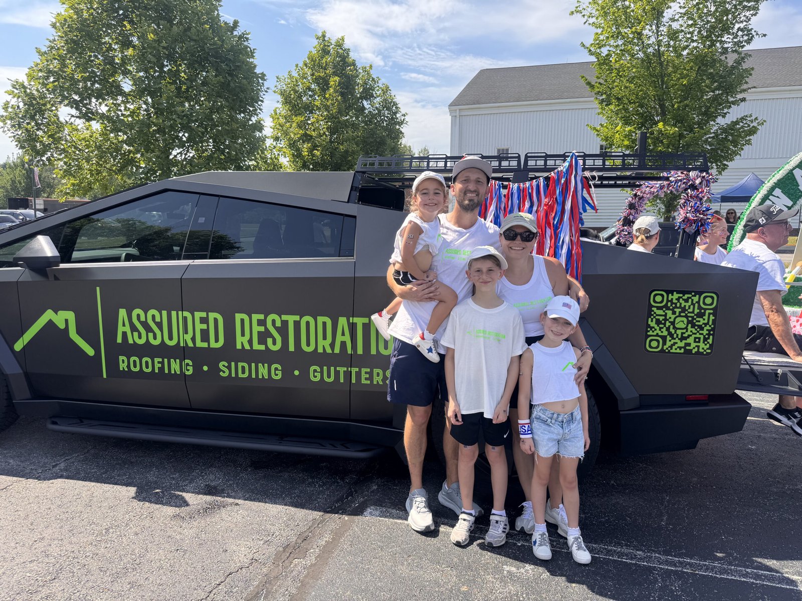 Thomas Douglas and his family representing Assured Restoration in Central Ohio