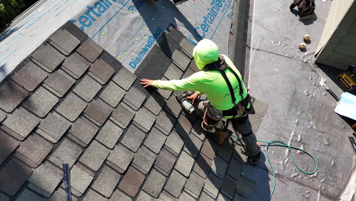 Assured Restoration crew installing a complete roofing system in Central Ohio